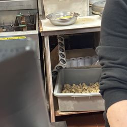 Hot Wok - Frozen chicken sitting out in tubs