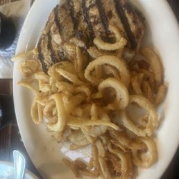 Grilled chicken breast with onion straws Grilled chicken breast with onion straws