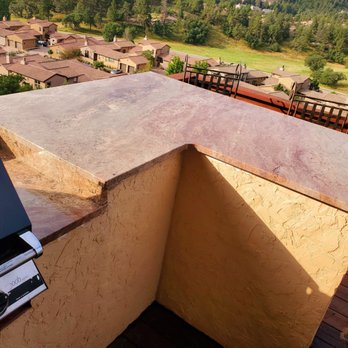 Pinnacle Stoneworks - a grill on a patio overlooking a town - General Contractors Near Me - Denver, Colorado Pinnacle Stoneworks - a grill on a patio overlooking a town - General Contractors Near Me - Denver, Colorado