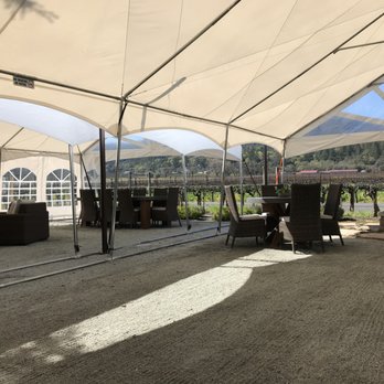 Benessere Vineyards - Outdoor tented patio area at Benessere Vineyards in St. Helena. - Wineries Near Me - Saint Helena, California Benessere Vineyards - Outdoor tented patio area at Benessere Vineyards in St. Helena. - Wineries Near Me - Saint Helena, California
