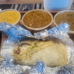 Chicken Tikka Masala. Chana Masala. Daal Makhani. Garlic Naan.