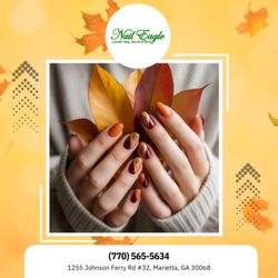 Nail Eagle - Orange and red nails with golden glitter lines -- bold and glowing like autumn sunsets. Perfect for cozy nights and holiday dinners!