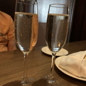 Triple George Grill - Two glasses Prosecco - Steakhouses Near Me - Las Vegas, Nevada Triple George Grill - Two glasses Prosecco - Steakhouses Near Me - Las Vegas, Nevada