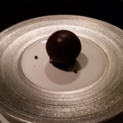 Passion fruit parfait in a giant chocolate ball