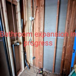Eighteen Oaks Construction - What used to be a hallway closet and a bathroom closet, soon to be new shower in primary bedroom