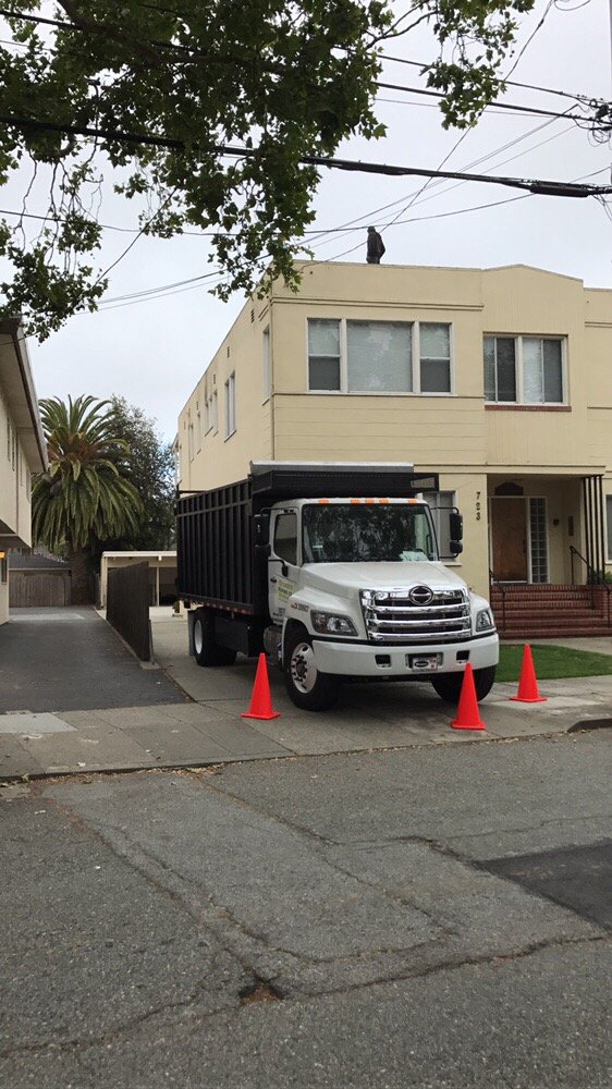 Slide of Caruzo's Roofing Contractors