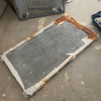 StorageMart - Trying to remove rust from the shelf of a stainless steel prep table by soaking it in vinegar - Self Storage Near Me - Athens, Georgia
