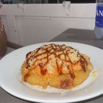 Nagoya - Salmon Pizza, pizza part is rice fried inside tempura like a huge tempura rice. Yummy! - Japanese Near Me - San Juan, Puerto Rico Nagoya - Salmon Pizza, pizza part is rice fried inside tempura like a huge tempura rice. Yummy! - Japanese Near Me - San Juan, Puerto Rico