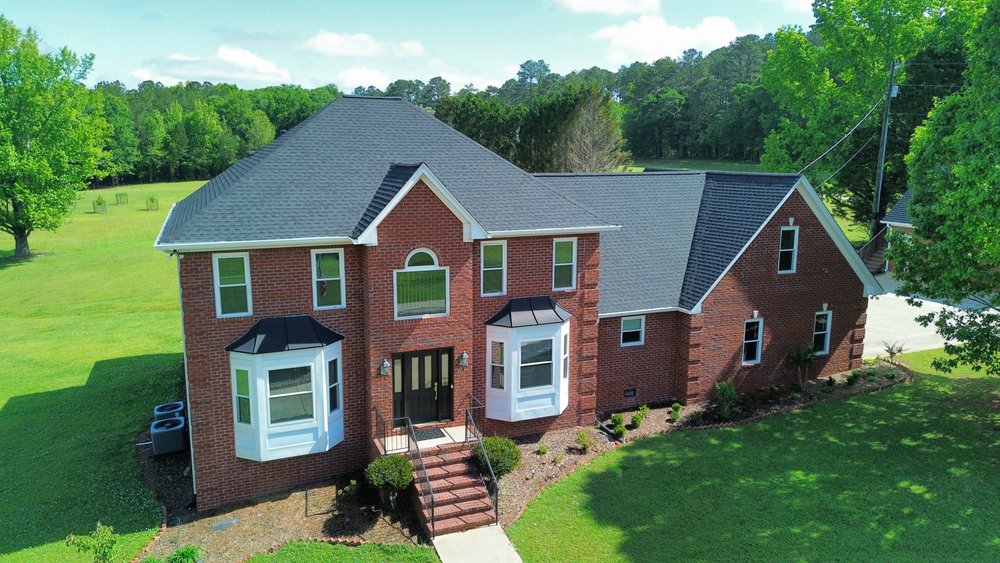 Slide of Pitch Perfect Roofing and Gutters