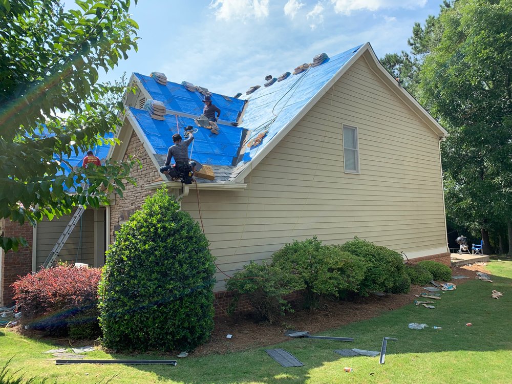 Slide of K and R Roofing