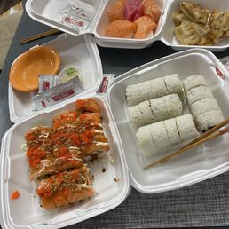 Our togo order: red dragon, double salmon, spicy tuna, nigiri and dumplings. All under $40!