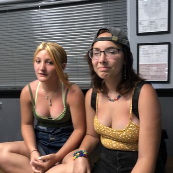 Destin Tattoo Company - My daughter and her friend waiting to get helix pierced - Piercing Near Me - Destin, Florida