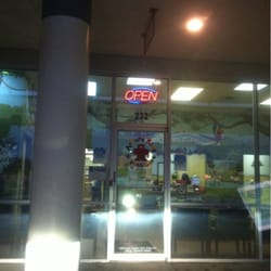 Acute Kids Urgent Care - Front door at night.