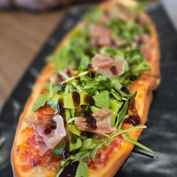 The Dotted Line - Prosciutto and arugula flatbread - Breakfast & Brunch Near Me - Honolulu, Hawaii