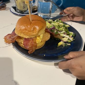 Whiskey Bird - Breakfast sandwich with side of greens - New American Near Me - Atlanta, Georgia Whiskey Bird - Breakfast sandwich with side of greens - New American Near Me - Atlanta, Georgia