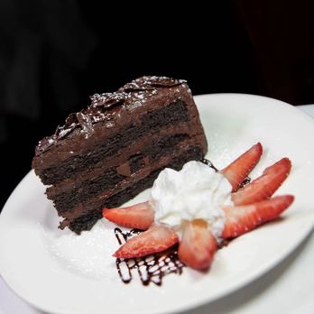 Cara Mia - a slice of chocolate cake and strawberries - Italian Near Me - Millburn, New Jersey