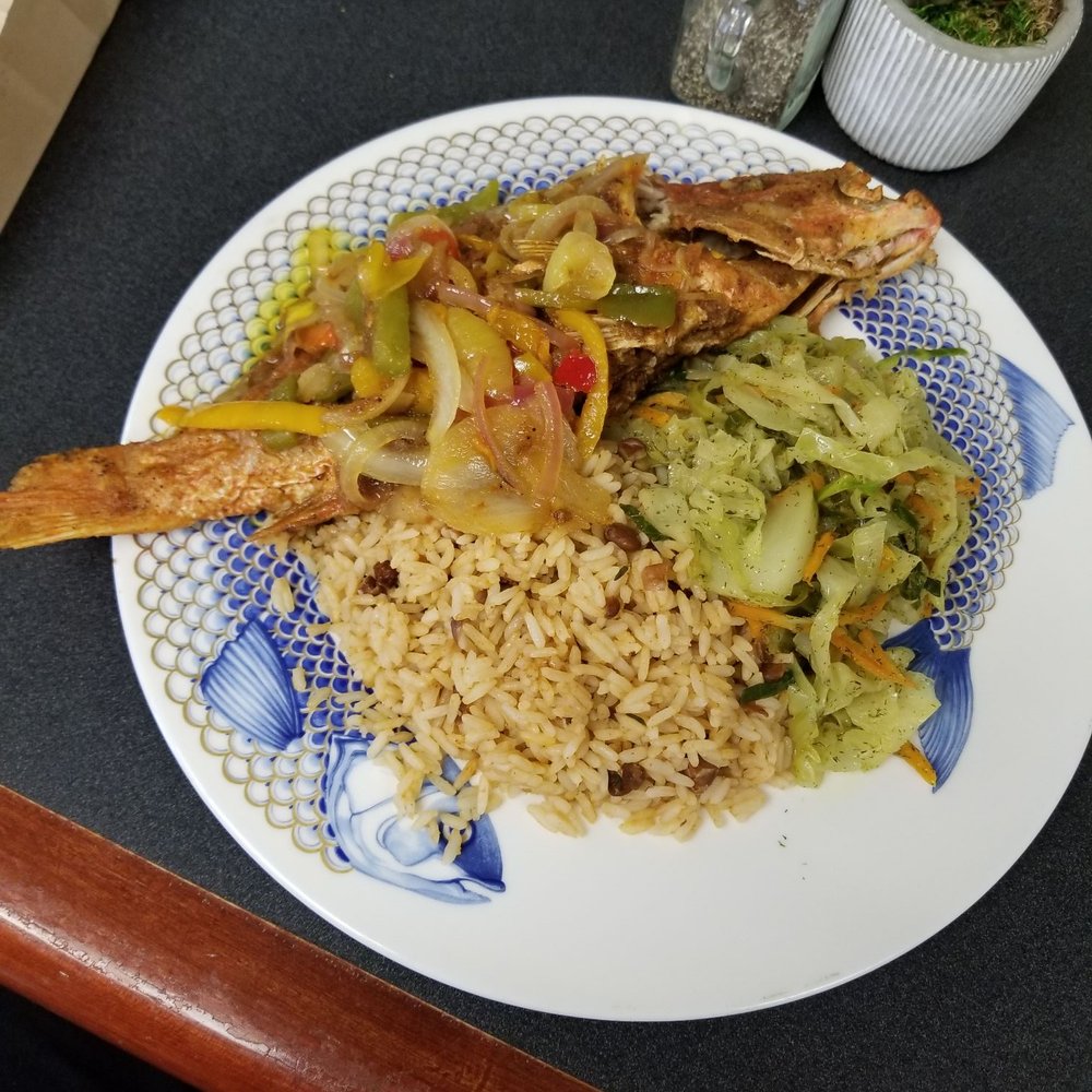 Red snapper with rice & peas and cabbage