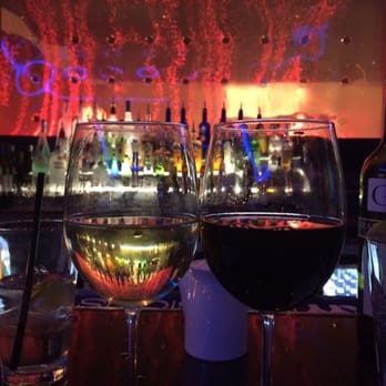 Passion Fin - Enjoying Chardonnay and Malbec with our lovely bartender Suri! - Asian Fusion Near Me - Vienna, Virginia