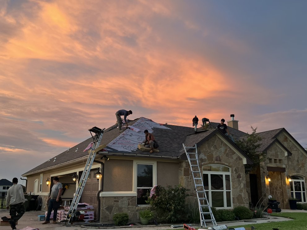 Slide of Tramel Roofing