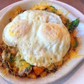 The Cracked Egg - Build your own skillet with over medium eggs, bacon, spinach, and mushrooms - Breakfast & Brunch Near Me - Las Vegas, Nevada The Cracked Egg - Build your own skillet with over medium eggs, bacon, spinach, and mushrooms - Breakfast & Brunch Near Me - Las Vegas, Nevada