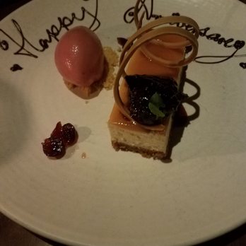 Scarpetta - Ricotta cheesecake (with Happy Anniversary mistakenly written on the plate) - Italian Near Me - New York, New York