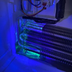 Quality Repairs - Utilizing UV dye leak detection on a refrigerator sealed system. We find and fix the exact source of refrigerant leaks.