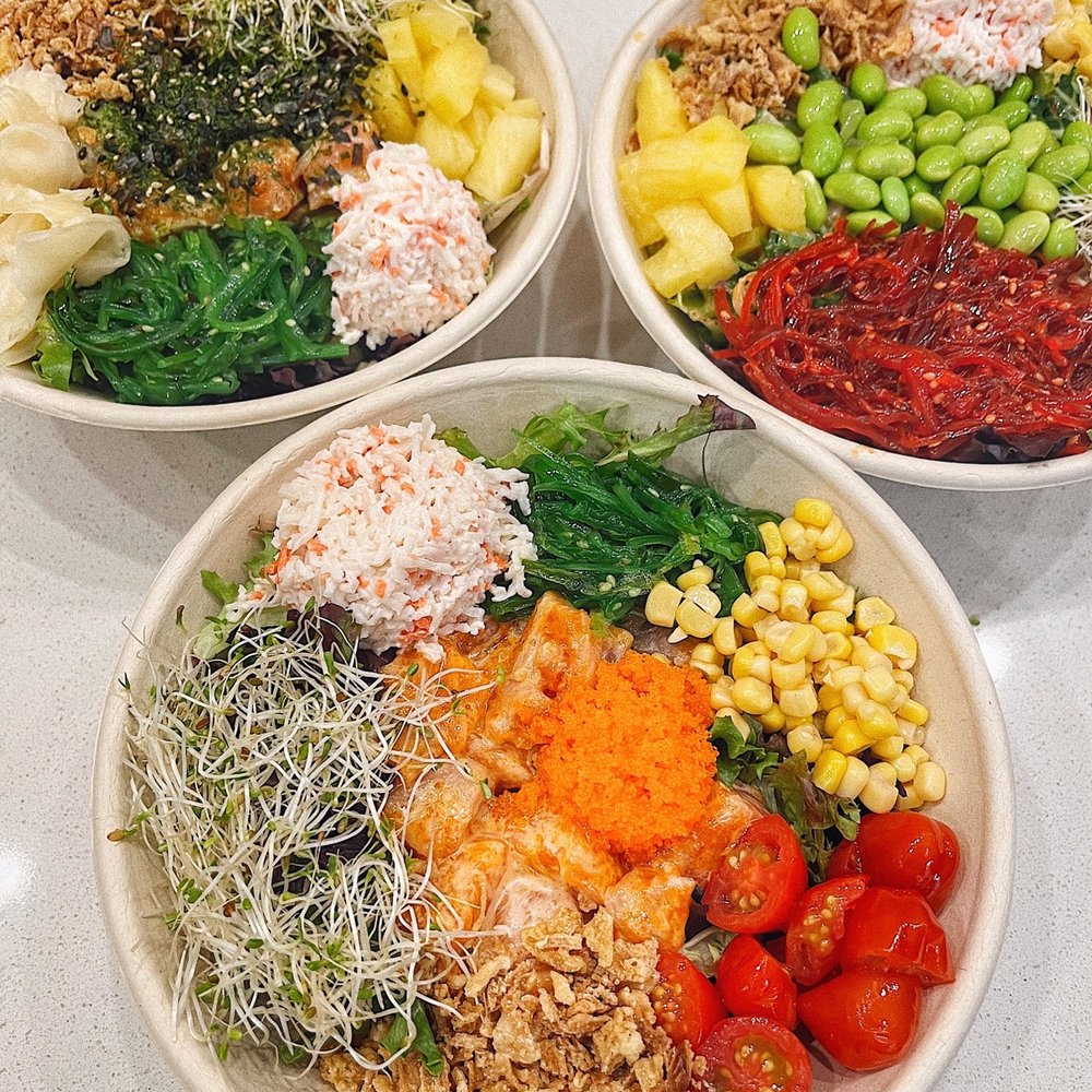 three bowls of food on a table three bowls of food on a table