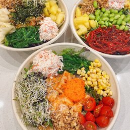 three bowls of food on a table three bowls of food on a table