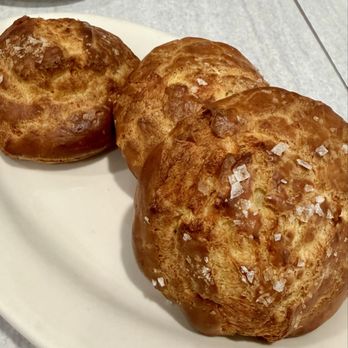 Bistro Metzger - Gougeres - a savory choux pastry with cheese and flaky salt - Desserts Near Me - Washington, DC, District of Columbia Bistro Metzger - Gougeres - a savory choux pastry with cheese and flaky salt - Desserts Near Me - Washington, DC, District of Columbia