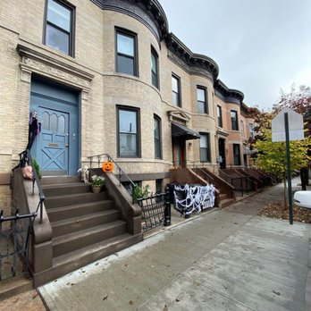 Innovation Construction NY - a row of townhouses on a residential street - Masonry/Concrete Near Me - Brooklyn, New York