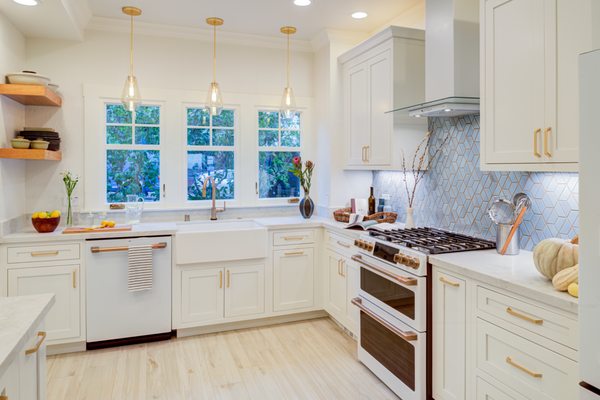 Kitchen Remodels - A kitchen remodel can significantly improve the value of your home by enhancing both functionality and aesthetics. Here are several ways in which a kitchen remodel can positively impact your home's value:

Increased Home Appeal: A modern and aesthetically pleasing kitchen is a major selling point for potential buyers. Upgrading the look of your kitchen with contemporary design elements, such as new cabinets, countertops, and flooring, can make your home more attractive.
Enhanced Functionality: Improving the layout and functionality of your kitchen can make it more convenient and enjoyable to use. Features like additional storage space, a well-organized layout, and high-quality appliances can appeal to buyers who value a practical and efficient kitchen.
Energy-Efficient Appliances: Upgrading to energy-efficient appliances not only reduces utility costs for the homeowner but also adds value to the property. Many homebuyers appreciate modern, energy-saving features.
Quality Materials: Using high-quality materials for countertops, cabinets, and flooring can give your kitchen a luxurious feel. Quality materials not only look better but also tend to last longer, adding to the overall value of your home.
Smart Technology Integration: Integrating smart home technology in the kitchen, such as smart appliances, lighting, or a smart thermostat, can be an attractive feature for tech-savvy buyers.
Increased Home Resale Value: A well-designed and updated kitchen is one of the key areas that potential buyers consider. Investing in a kitchen remodel can increase the resale value of your home, providing a good return on investment.
Expanded Kitchen Space: If possible, expanding the kitchen space or opening it up to adjacent rooms can create a more open and inviting atmosphere. Open-concept kitchens are popular among homebuyers and can make your home feel more spacious.
Improved Lighting: Adequate and well-designed lighting can enhance the overall ambiance of the kitchen. Consider adding under-cabinet lighting, pendant lights, or recessed lighting to create a bright and welcoming space.
Upgraded Plumbing and Fixtures: Upgrading plumbing fixtures, such as faucets and sinks, can add a touch of luxury and modernity to your kitchen. Water-saving fixtures may also appeal to environmentally conscious buyers.
Increased Storage: Ample storage space is highly desirable in a kitchen. Adding more cabinets, pantry space, or clever storage solutions can make your kitchen more functional and appealing to potential buyers.
Before starting a kitchen remodel, it's essential to consider the preferences of potential buyers in your local real estate market. While certain upgrades are generally well-received, it's essential to strike a balance between personal preferences and features that have broad appeal. Consulting with a real estate professional or a home appraiser can provide valuable insights tailored to your specific market.