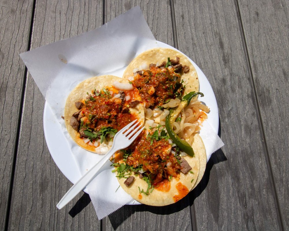 Taqueria La Mordida Logo