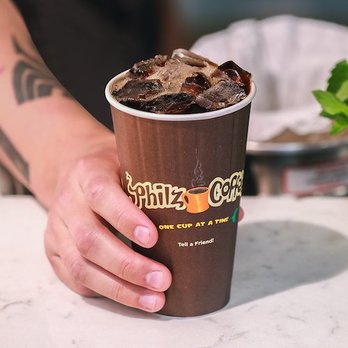 Philz Coffee - a person holding a cup of coffee - Coffee & Tea Near Me - South San Francisco, California Philz Coffee - a person holding a cup of coffee - Coffee & Tea Near Me - South San Francisco, California
