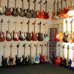 JC's Guitars & Music Lessons - Great selection of new and used guitars.