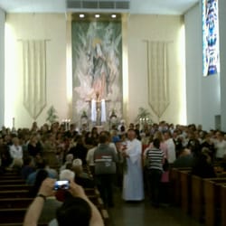 Our Lady of the Assumption Catholic Church - Mothers received a flower and were invited to the altar celebrating Mothers Day.