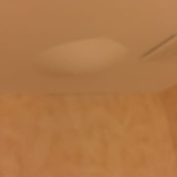 Henlopen Hotel - Ceiling bubble full of water above toilet, dripping - Hotels Near Me - Rehoboth Beach, Delaware