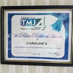 Caroline's Cafe & Gifts - WTMJ Blue Ribbon Award for excellence in food preparation and customer care, Caroline's was described as a "hidden gem".