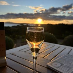 Mudbrick Vineyard and Restaurant - Bubbly with the sunset
