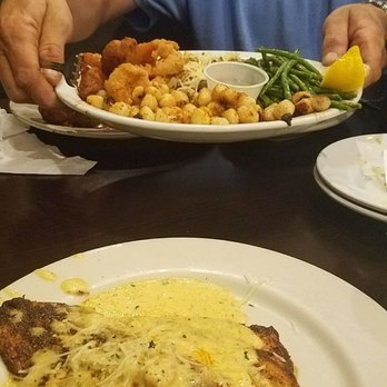 Rusty's Riverfront Grill - The forefront shows the House Specialty Redfish.The back of the photo is the Captain's plate.If you get a meal here, you won't leave hungry! - Seafood Near Me - Vicksburg, Mississippi