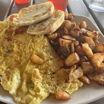 Gulf Drive Cafe - Bacon, tomato and cheddar omelette with crispy home fries and English muffin - Seafood Near Me - Bradenton Beach, Florida