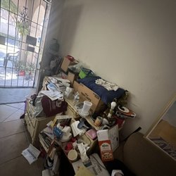 Rocket Junk Removal Services - Complete home decluttering project -- unwanted items removed room by room.
