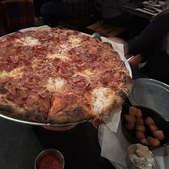 The Black Duck Cask and Bottle - Pepperoni Pie and Sweet Potato Tots - Pizza Near Me - Issaquah, Washington The Black Duck Cask and Bottle - Pepperoni Pie and Sweet Potato Tots - Pizza Near Me - Issaquah, Washington