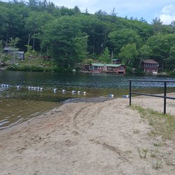 Erving State Forest - Bottom of wooden ramp onto sand, rubber mat into the water