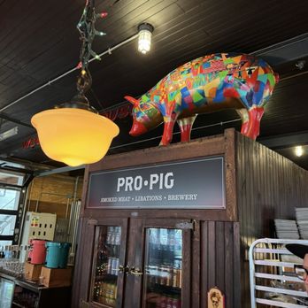 Prohibition Pig - The pig above their bar. - Barbeque Near Me - Waterbury, Vermont