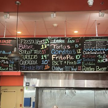 La Zenita - Menu - A black chalkboard menu lists breakfast, Mexican, and American dishes with colorful chalk, including prices, in a restaurant setting. - Mexican Near Me - Albuquerque, New Mexico