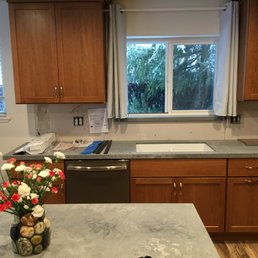 We weren't quite done in the photo... no backsplash or faucet etc., but you can see how lovely the cabinets look.