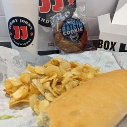 Jimmy John’s - Box Lunch - #4 Turkey Tom regular sandwich, oatmeal raisin cookie, pickle spear, Jimmy chips regular and a regular fountain drink.
