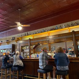 people sitting at a bar