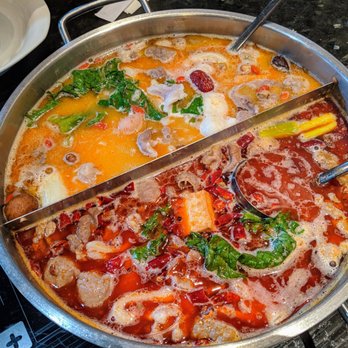 Happy Lamb Hot Pot - Ingredients cooking away in the half and half broths! - Chinese Near Me - Vancouver, British Columbia Happy Lamb Hot Pot - Ingredients cooking away in the half and half broths! - Chinese Near Me - Vancouver, British Columbia