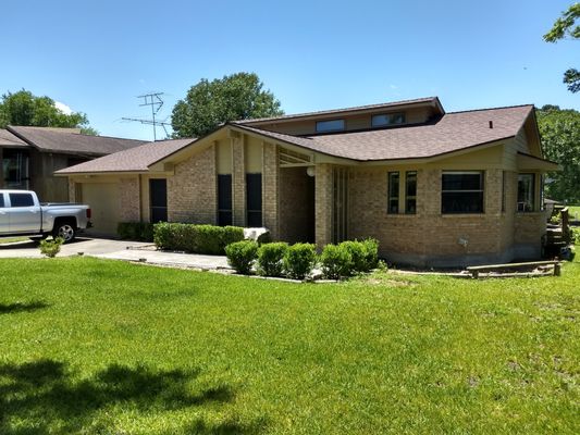 Inman Roofing & Contracting Services Logo